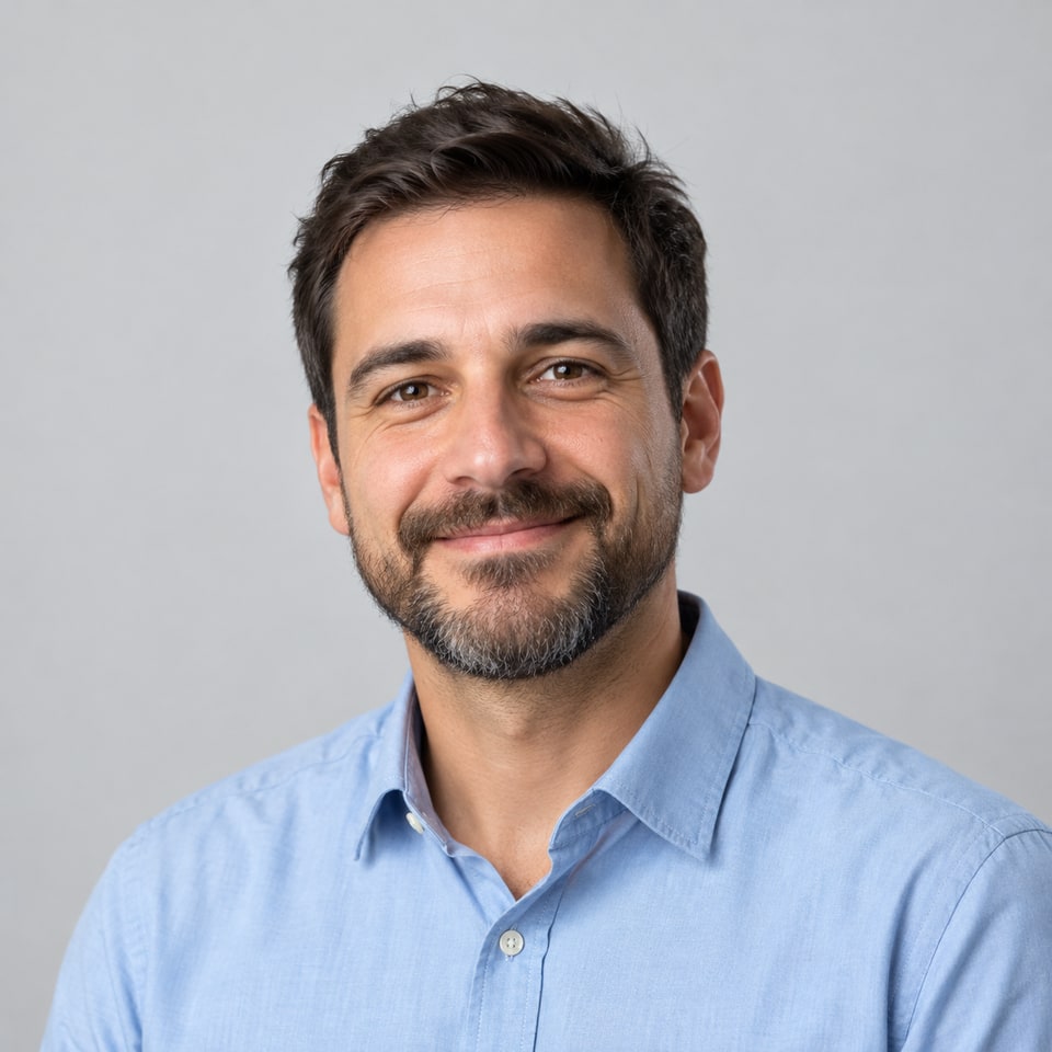 AI-generated portrait of a smiling man with short hair and a beard